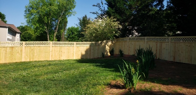 Wood privacy fence with lattice top in Charlotte, Denver area